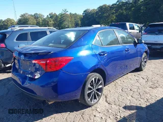 2017 Toyota Corolla L with VIN 2T1BURHE0HC937580, listed as a IAAI auction lot 40591004 with 112,411 mi miles and . Bid and sale history available at DreamBid. Image 4.