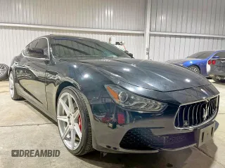2014 Maserati Ghibli S Q4 with VIN ZAM57RTA9E1112724, listed as a Copart auction lot 62614795 with 45,525 mi miles and Salvage title. Bid and sale history available at DreamBid. Image 1.