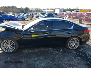 2014 Infiniti Q50 with VIN JN1BV7APXEM692303, listed as a IAAI auction lot 41325631 with 115,803 mi miles. Bid and sale history available at carsss.com. Image 14.