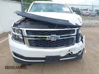2020 Chevrolet Tahoe LT with VIN 1GNSCBKC4LR181887, listed as a IAAI auction lot 42160821 with 106,757 mi miles and . Bid and sale history available at DreamBid. Image 18.