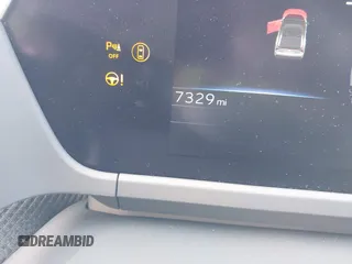 2024 Toyota bZ4X XLE z VIN JTMABACA2RA069207, wystawiony jako IAAI lot #41632667 z przebiegiem 7329 mil mil oraz . Historia ofert i sprzedaży dostępna na DreamBid. Obrazek 16.