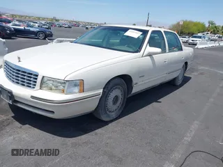 1999 Cadillac DeVille DHS z VIN 1G6KE54Y3XU714363, wystawiony jako IAAI lot #42257217 z przebiegiem 287 542 mil mil oraz . Historia ofert i sprzedaży dostępna na DreamBid. Obrazek 2.