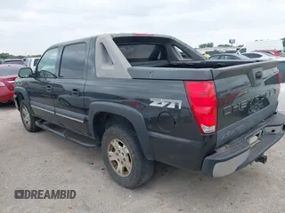2003 Chevrolet Avalanche with VIN 3GNEK13TX3G311583, listed as a IAAI auction lot 42032187 with 301,008 mi miles. Bid and sale history available at carsss.com. Image 3.