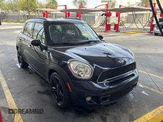 2011 MINI Countryman S z VIN WMWZC3C53BWL79029, wystawiony jako Copart lot #45524445 z przebiegiem 128 744 mil mil oraz Czysty tytuł • Clean title. Historia ofert i sprzedaży dostępna na DreamBid. Obrazek 1.
