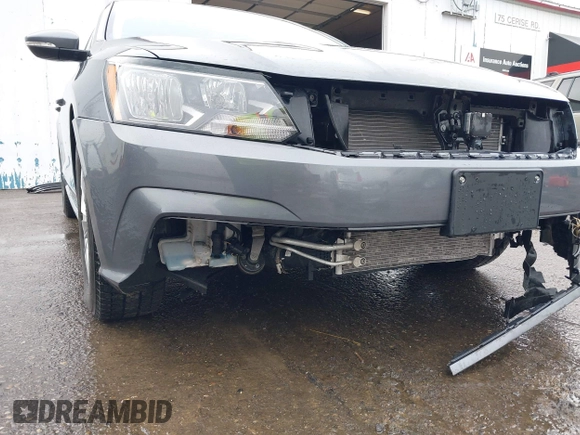 2017 Volkswagen Passat S z VIN 1VWAT7A3XHC071775, wystawiony jako IAAI lot #41775028 z przebiegiem 58 945 mil mil oraz . Historia ofert i sprzedaży dostępna na DreamBid. Obrazek 6.