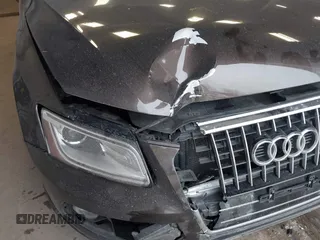 2014 Audi Q5 Premium z VIN WA1CFAFP1EA058507, wystawiony jako IAAI lot #41501694 z przebiegiem 114 181 mil mil oraz . Historia ofert i sprzedaży dostępna na DreamBid. Obrazek 6.