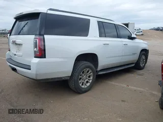 2019 GMC Yukon XL SLT with VIN 1GKS2GKC7KR165419, listed as a IAAI auction lot 40977930 with 167,195 mi miles and . Bid and sale history available at carsss.com. Image 4.