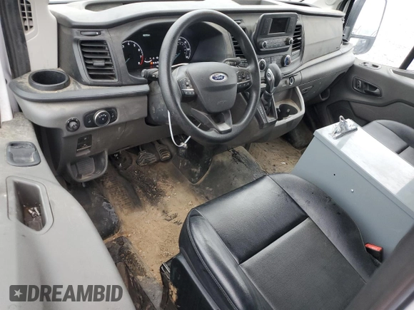2023 Ford Transit Cargo with VIN 1FTBR1C88PKB21007, listed as a Copart auction lot 70991064 with 16,219 mi miles and Salvage Title. Bid and sale history available at DreamBid. Image 8.