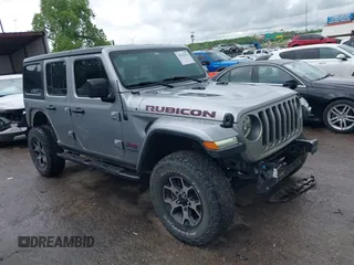 2018 Jeep Wrangler Unlimited Rubicon with VIN 1C4HJXFG4JW174603, listed as a IAAI auction lot 42202302 with 120,229 mi miles and . Bid and sale history available at DreamBid. Image 14.