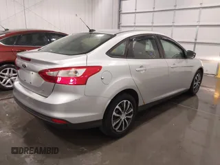 2012 Ford Focus SE with VIN 1FAHP3F24CL217049, listed as a IAAI auction lot 41825450 with 86,573 mi miles. Bid and sale history available at carsss.com. Image 4.