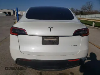 2021 Tesla Model Y Long Range z VIN 5YJYGDEE2MF100232, wystawiony jako Copart lot #50183425 z przebiegiem 95 527 mil mil oraz Szkoda całkowita • Salvage title. Historia ofert i sprzedaży dostępna na DreamBid. Obrazek 6.