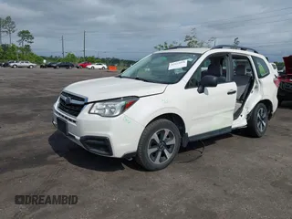 2018 Subaru Forester z VIN JF2SJABC5JH444739, wystawiony jako IAAI lot #42123918 z przebiegiem 124 520 mil mil oraz . Historia ofert i sprzedaży dostępna na DreamBid. Obrazek 18.