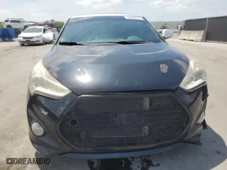 2014 Hyundai Veloster Turbo with VIN KMHTC6AE0EU192680, listed as a Copart auction lot 54486575 with 129,949 mi miles and Clean Title. Bid and sale history available at carsss.com. Image 5.