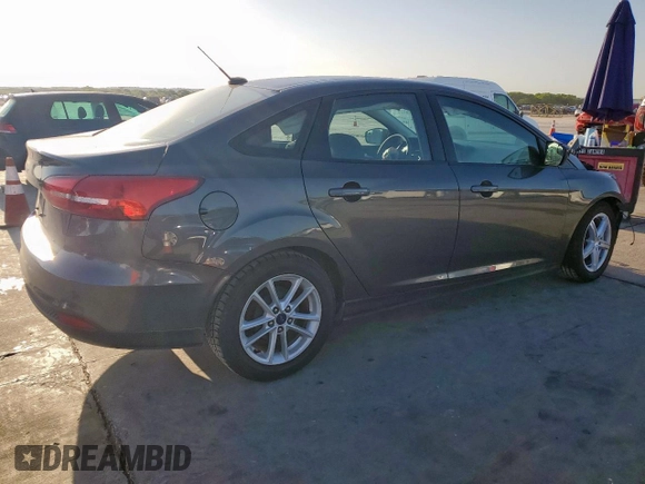 2018 Ford Focus SE z VIN 1FADP3F2XJL256272, wystawiony jako Copart lot #52651675 z przebiegiem 37 897 mil mil oraz Szkody całkowita. Historia ofert i sprzedaży dostępna na DreamBid. Obrazek 3.