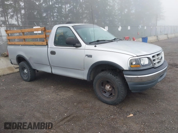 1999 Ford F-150 with VIN 2FTZF1828XCA85643, listed as a IAAI auction lot 41347113 with 173,813 mi miles and . Bid and sale history available at DreamBid. Image 1.