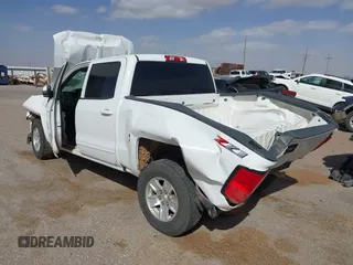 2018 Chevrolet Silverado 1500 LT with VIN 3GCUKREC9JG316576, listed as a IAAI auction lot 41830992 with 153,467 mi miles. Bid and sale history available at carsss.com. Image 3.