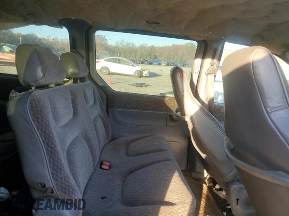 2000 Plymouth Voyager Grand SE z VIN 2P4GP44G6YR631700, wystawiony jako Copart lot #82873844 z przebiegiem Nie podano mil oraz Szkody całkowita. Historia ofert i sprzedaży dostępna na DreamBid. Obrazek 11.