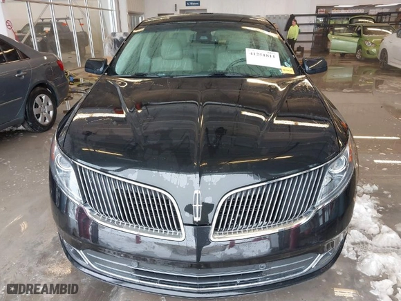 2015 Lincoln MKS with VIN 1LNHL9DK9FG604085, listed as a IAAI auction lot 41251811 with 58502 miles. Bid and sale history available at carsss.com. Image 13.