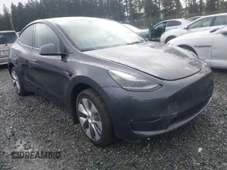 2023 Tesla Model Y Long Range with VIN 7SAYGAEE4PF871281, listed as a IAAI auction lot 41989805 with 15,501 mi miles. Bid and sale history available at carsss.com. Image 1.
