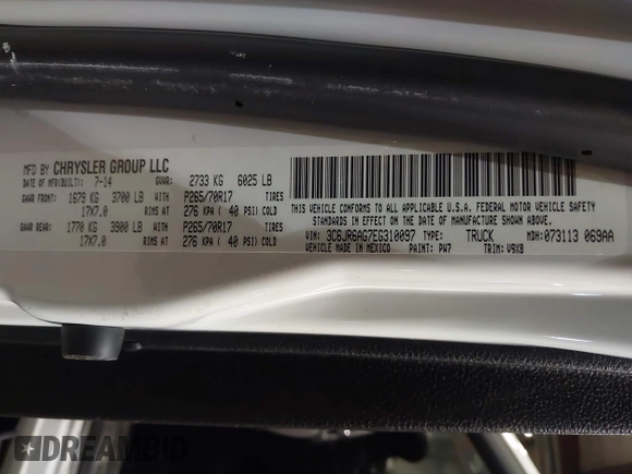 2014 Ram 1500 Express with VIN 3C6JR6AG7EG310097, listed as a IAAI auction lot 41409343 with 134,140 mi miles and . Bid and sale history available at DreamBid. Image 9.
