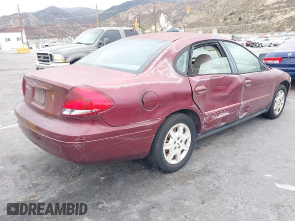 2004 Ford Taurus SE with VIN 1FAFP53214G150248, listed as a IAAI auction lot 41543177 with 99,553 mi miles and . Bid and sale history available at DreamBid. Image 4.