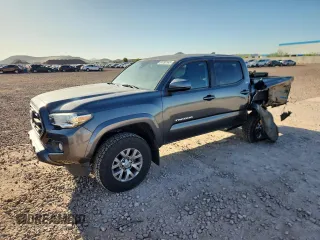 2018 Toyota Tacoma SR5 z VIN 3TMAZ5CN5JM066282, wystawiony jako Copart lot #61197145 z przebiegiem 85 916 mil mil oraz Szkoda całkowita • Salvage title. Historia ofert i sprzedaży dostępna na DreamBid. Obrazek 1.
