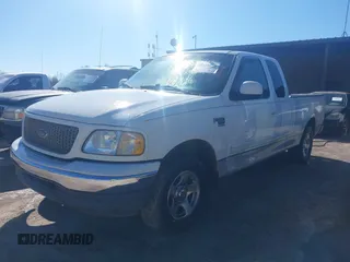 2002 Ford F-150 XL z VIN 1FTRX17W72NB74561, wystawiony jako IAAI lot #41638886 z przebiegiem Nie podano mil oraz . Historia ofert i sprzedaży dostępna na DreamBid. Obrazek 2.