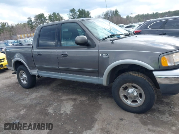 2003 Ford F-150 XLT with VIN 1FTRW08L63KA37275, listed as a IAAI auction lot 41875128 with 133,257 mi miles. Bid and sale history available at carsss.com. Image 13.