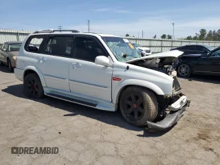 2002 Suzuki XL7 Standard with VIN JS3TX92V224119042, listed as a Copart auction lot 54511695 with Not provided miles and Salvage title. Bid and sale history available at DreamBid. Image 4.