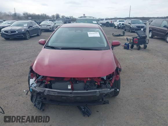 2023 Toyota Corolla Hybrid LE with VIN JTDBCMFE2PJ003738, listed as a IAAI auction lot 41620152 with 4,926 mi miles. Bid and sale history available at carsss.com. Image 12.