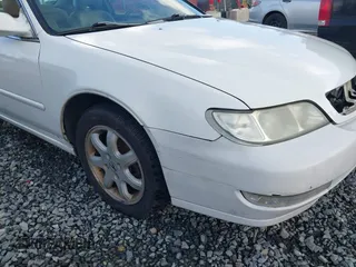 1998 Acura CL Premium z VIN 19UYA2255WL005109, wystawiony jako IAAI lot #41712118 z przebiegiem 242 642 mil mil oraz . Historia ofert i sprzedaży dostępna na DreamBid. Obrazek 6.