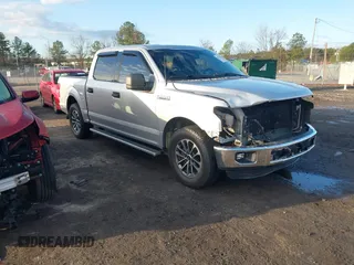2015 Ford F-150 XL with VIN 1FTEW1CF0FFA58495, listed as a IAAI auction lot 41126364 with 164,284 mi miles. Bid and sale history available at carsss.com. Image 1.