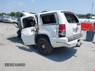 2013 Chevrolet Tahoe Commercial with VIN 1GNLC2E08DR216213, listed as a IAAI auction lot 37406061 with Not provided miles and . Bid and sale history available at DreamBid. Image 3.