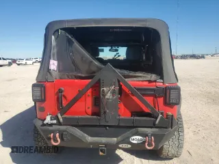 2016 Jeep Wrangler Unlimited Rubicon with VIN 1C4BJWFGXGL183011, listed as a Copart auction lot 42310535 with 165,227 mi miles and Salvage title. Bid and sale history available at DreamBid. Image 6.