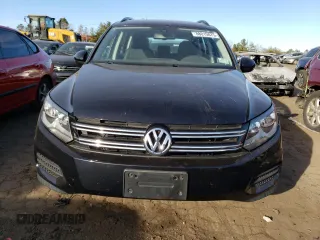 2016 Volkswagen Tiguan S with VIN WVGBV7AX7GW597813, listed as a Copart auction lot 88015075 with 73,544 mi miles and Salvage Title. Bid and sale history available at DreamBid. Image 5.