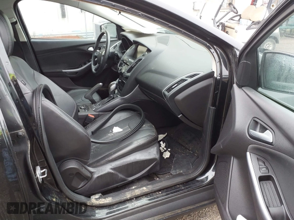 2014 Ford Focus Titanium with VIN 1FADP3J25EL310199, listed as a IAAI auction lot 40682901 with 84,885 mi miles and . Bid and sale history available at DreamBid. Image 5.
