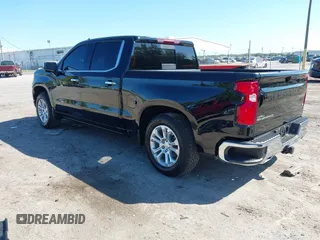 2024 Chevrolet Silverado 1500 LTZ with VIN 1GCUDGE81RZ298421, listed as a IAAI auction lot 41775039 with 6,900 mi miles and . Bid and sale history available at DreamBid. Image 3.