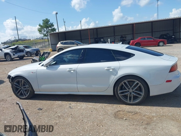 2016 Audi A7 Premium Plus with VIN WAUWGAFC2GN021696, listed as a IAAI auction lot 42595234 with 112,464 mi miles and . Bid and sale history available at DreamBid. Image 14.