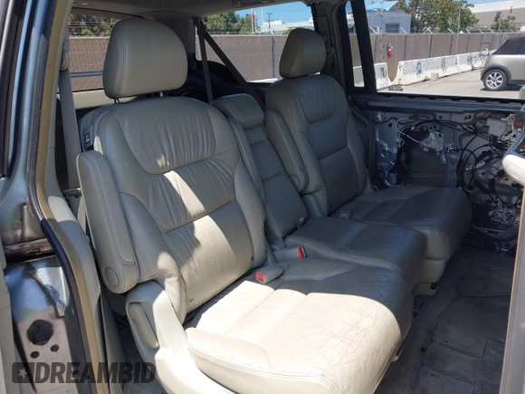 2006 Honda Odyssey EX-L z VIN 5FNRL38716B051664, wystawiony jako IAAI lot #42520320 z przebiegiem 304 835 mil mil oraz . Historia ofert i sprzedaży dostępna na DreamBid. Obrazek 8.