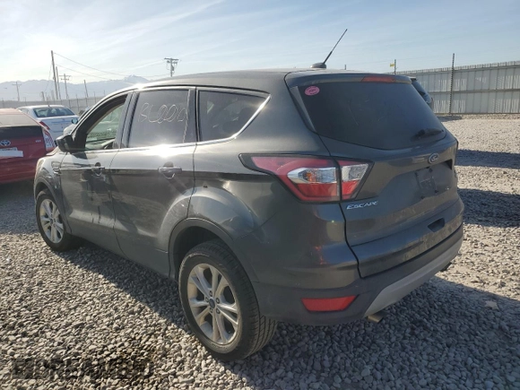 2017 Ford Escape SE z VIN 1FMCU0GD3HUF08778, wystawiony jako Copart lot #58224765 z przebiegiem 67 211 mil mil oraz Szkoda całkowita • Salvage title. Historia ofert i sprzedaży dostępna na DreamBid. Obrazek 2.