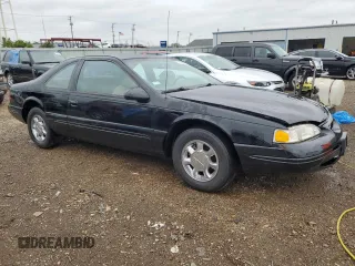 1997 Ford Thunderbird LX z VIN 1FALP62W0VH157636, wystawiony jako Copart lot #57436535 z przebiegiem 120 433 mil mil oraz Szkoda całkowita • Salvage title. Historia ofert i sprzedaży dostępna na DreamBid. Obrazek 4.