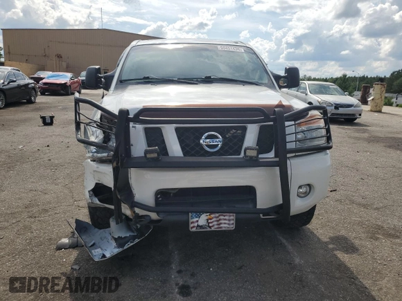 2012 Nissan Titan SV z VIN 1N6BA0EC2CN309207, wystawiony jako Copart lot #60451435 z przebiegiem 124 900 mil mil oraz Szkoda całkowita • Salvage title. Historia ofert i sprzedaży dostępna na DreamBid. Obrazek 5.