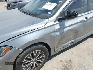 2021 Volkswagen Jetta S z VIN 3VWC57BU9MM015930, wystawiony jako IAAI lot #42020727 z przebiegiem 67 982 mil mil oraz . Historia ofert i sprzedaży dostępna na DreamBid. Obrazek 6.