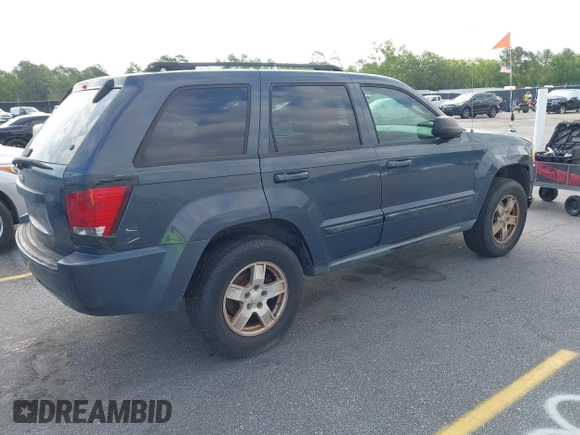2007 Jeep Grand Cherokee Laredo with VIN 1J8GS48K17C684497, listed as a IAAI auction lot 42136314 with 155,024 mi miles. Bid and sale history available at carsss.com. Image 4.
