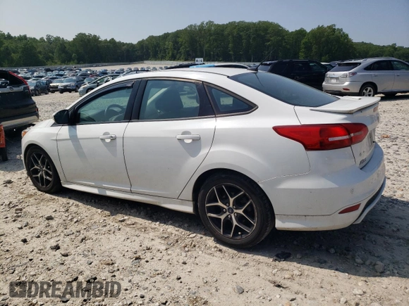 2015 Ford Focus SE with VIN 1FADP3F28FL332899, listed as a Copart auction lot 60055185 with 76,948 mi miles and Clean title. Bid and sale history available at DreamBid. Image 2.