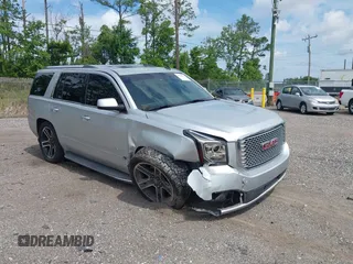 2015 GMC Yukon Denali z VIN 1GKS2CKJ1FR299436, wystawiony jako IAAI lot #42320184 z przebiegiem 201 757 mil mil oraz . Historia ofert i sprzedaży dostępna na DreamBid. Obrazek 1.