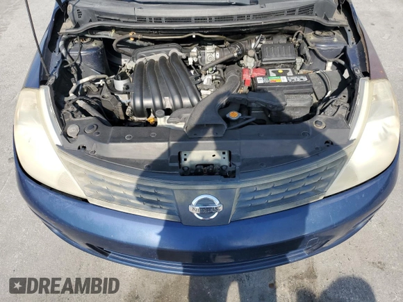 2009 Nissan Versa 1.6 z VIN 3N1CC11E49L476159, wystawiony jako Copart lot #53792025 z przebiegiem 242 459 mil mil oraz Szkoda całkowita • Salvage title. Historia ofert i sprzedaży dostępna na DreamBid. Obrazek 11.