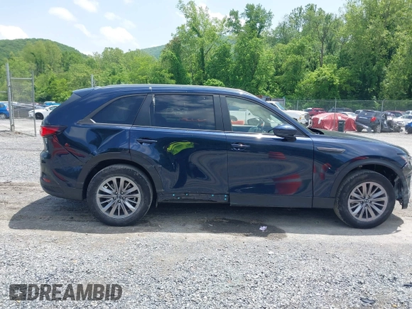 2024 Mazda CX-90 Select z VIN JM3KKAHD4R1142933, wystawiony jako IAAI lot #42269979 z przebiegiem 30 373 mil mil oraz . Historia ofert i sprzedaży dostępna na DreamBid. Obrazek 13.