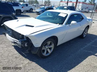 2018 Dodge Challenger SXT with VIN 2C3CDZAG4JH317735, listed as a IAAI auction lot 41642772 with 100,843 mi miles. Bid and sale history available at carsss.com. Image 2.