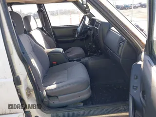 1999 Jeep Cherokee Sport with VIN 1J4FF68S0XL628564, listed as a IAAI auction lot 41508373 with 244,596 mi miles and . Bid and sale history available at DreamBid. Image 5.